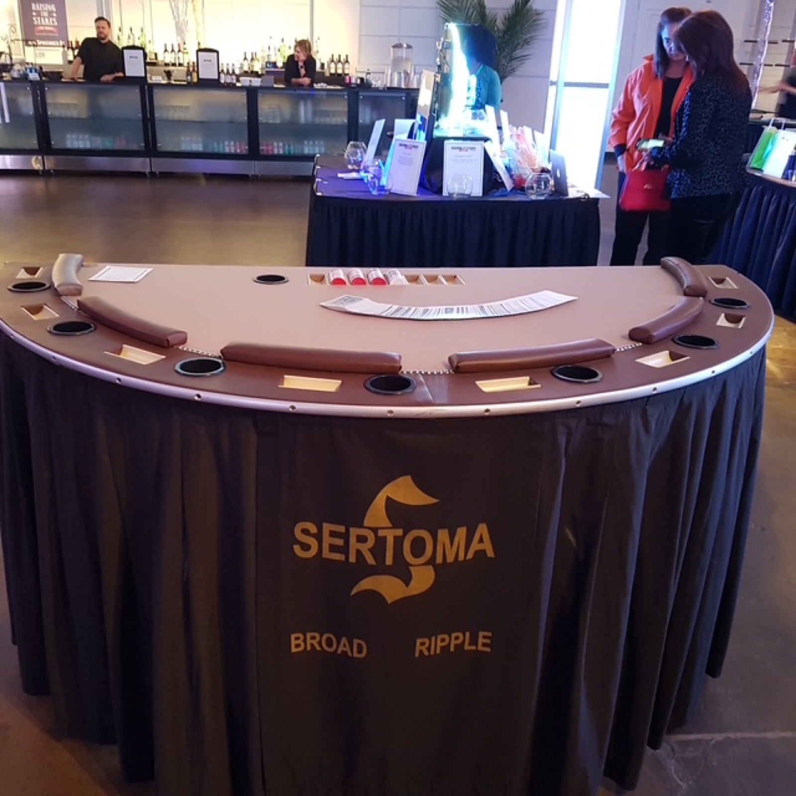 Blackjack table with a Sertoma Broad Ripple table skirt, set up for a casino party